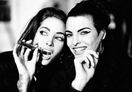 Christy Turlington and Linda Evangelista Elgort_Christy Turlington and Linda Evangelista by Arthur Elgort, the two Models smiling and pretending to smole cigars
