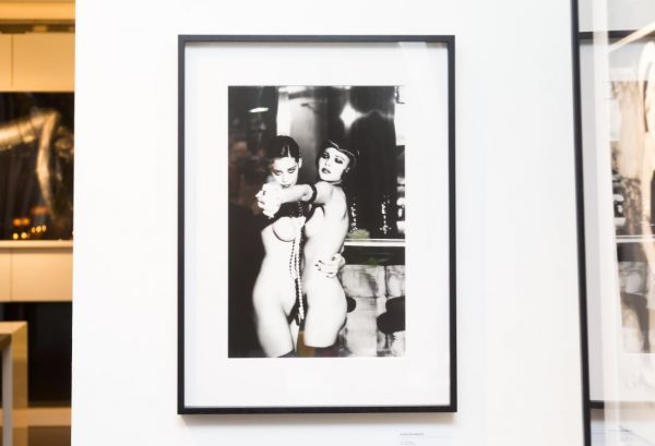 The last tango by Ellen von Unwerth, two nude models with pearls in tango pose framed black