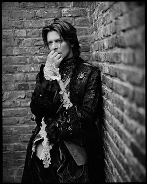 david bowie, in my stairwell david bowie, in my stairwell by Mark Seliger, portrait of the singer, leaning against a brick wall