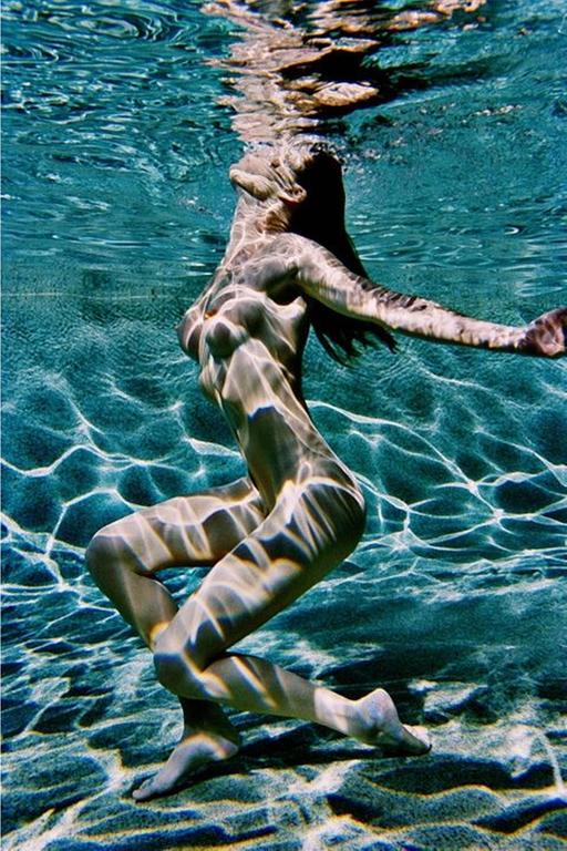 Carre Otis Underwater Color. 2001 Carre Otis Underwater Color. 2001 by Antoine Verglas, nude model underwater in a pool with sun reflections