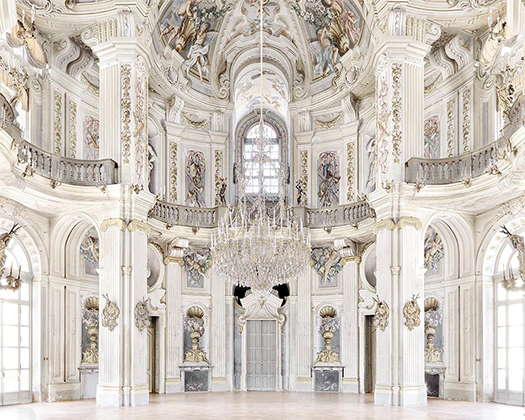 Castello di Stupinigi castle stupinigi by Massimo Listri , baroque interior with white stucco and pastel fresco, big chandelier and gallery