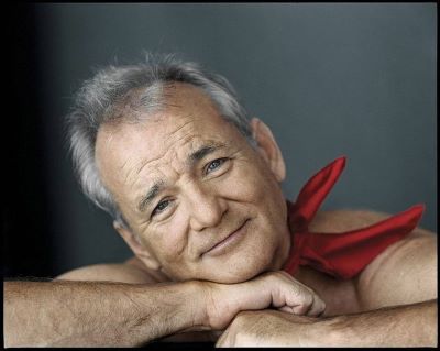 Bill Murray Bill Murray by Mark Seliger portrait of the actor wearing a red bandana around his nack, leaning his head on his arms