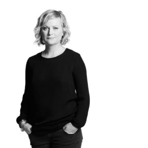 Amy Poehler by Timothy White, black and white portrait of the actress in a black shirt
