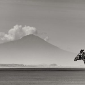 giraffe in front of mount kenya by Joachim Schmeisser, head and neck of a giraffe in front of the mountain and clouds