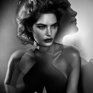 Catherine by Vincent Peters, double exposure of model in red lip and haltertop