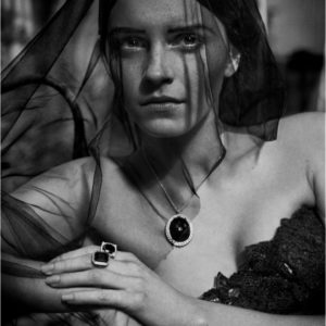 Emma Watson by Vincent Peters, the actress in black veil with big necklace and rings