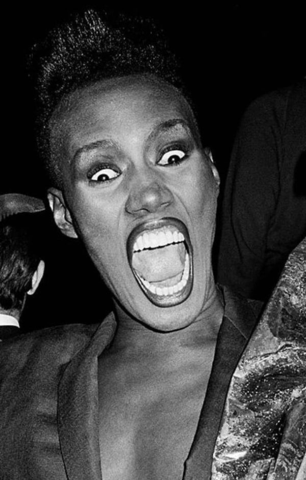 Grace Jones by Roxanne Lowit, portrait in b&w screaming