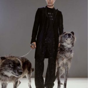 David Bowie, The Hunt by Markus Klinko, the singer in black suit with two wolfdogs